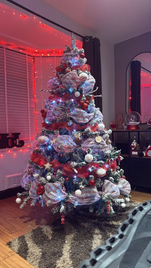7ft snow frosted Christmas tree.