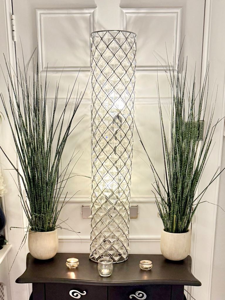 Tall lamp with 2 bulbs, silver metal crystal design , used by still looks great 