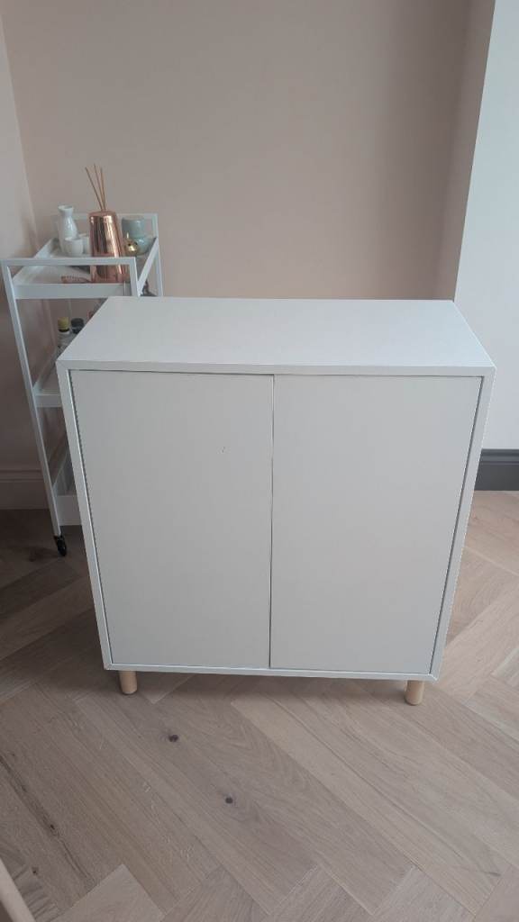 Eket cabinet with legs in white and wood 