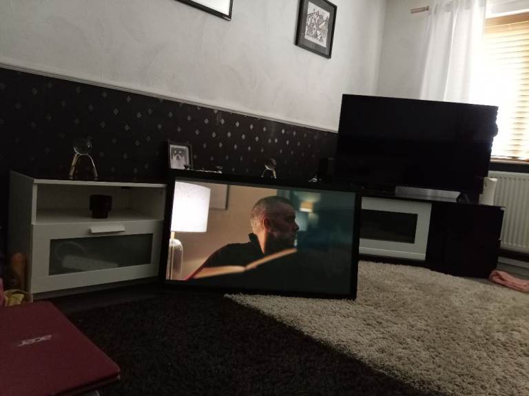 T V