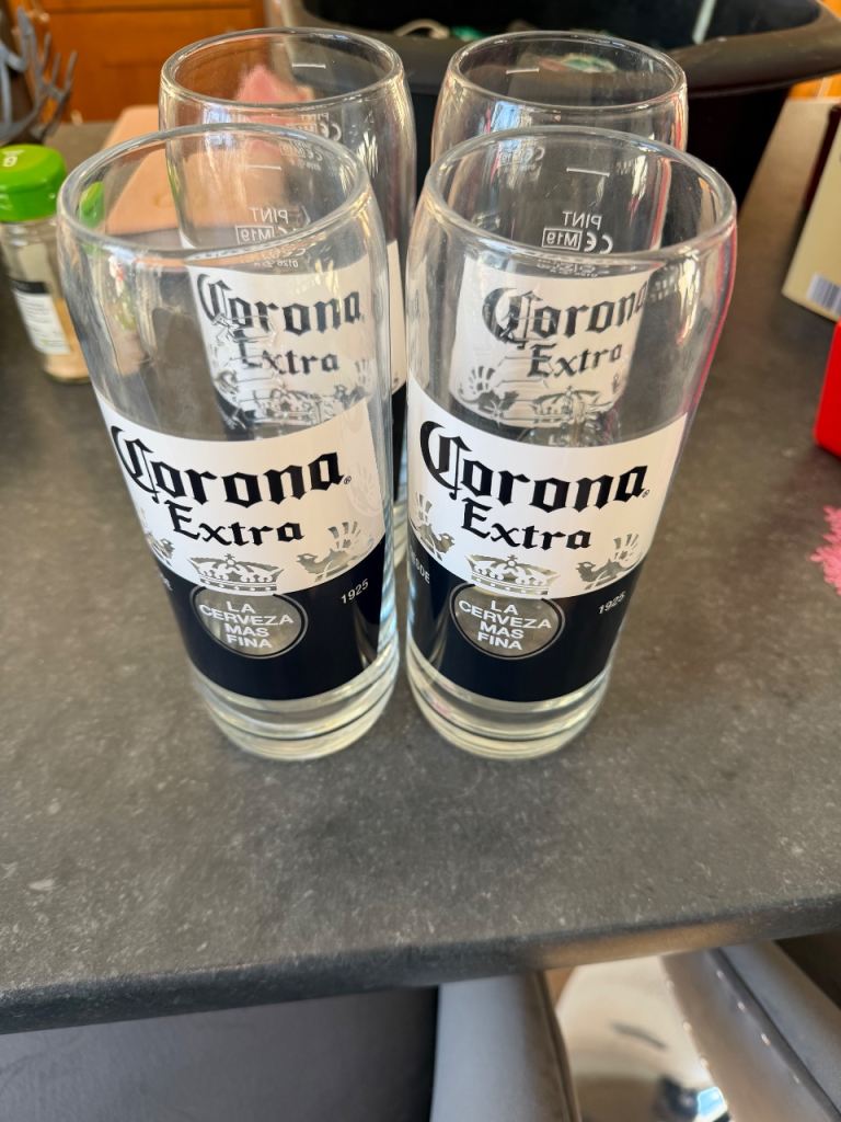 4 Corona pint glasses brand new 