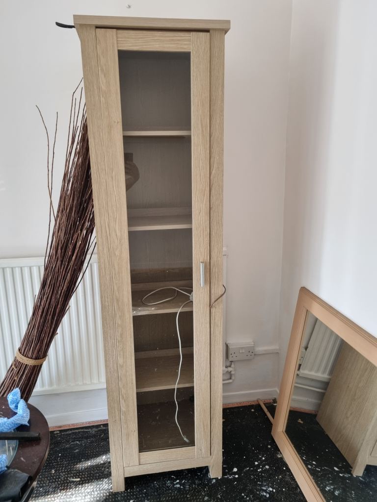 Tall cabinet with light 
