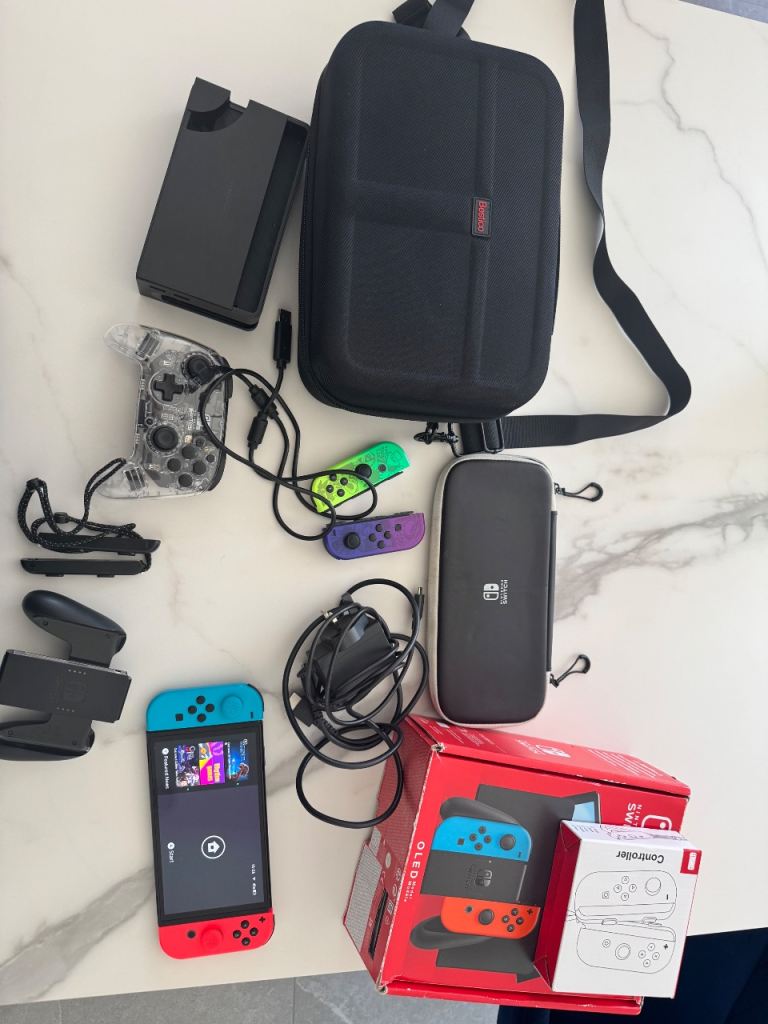 Nintendo Switch OLED with Extra Controllers and Accessories