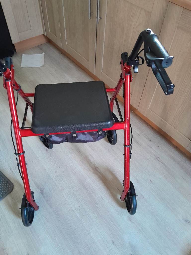 Red Mobility Walker with Seat and Storage Bag – Good Condition