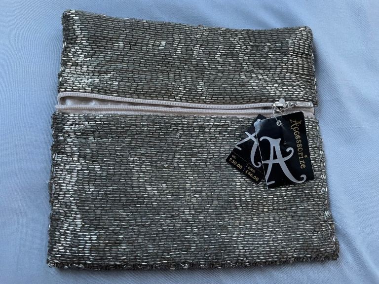 image for New with tags Accessorize flooding soft beaded clutch bag 