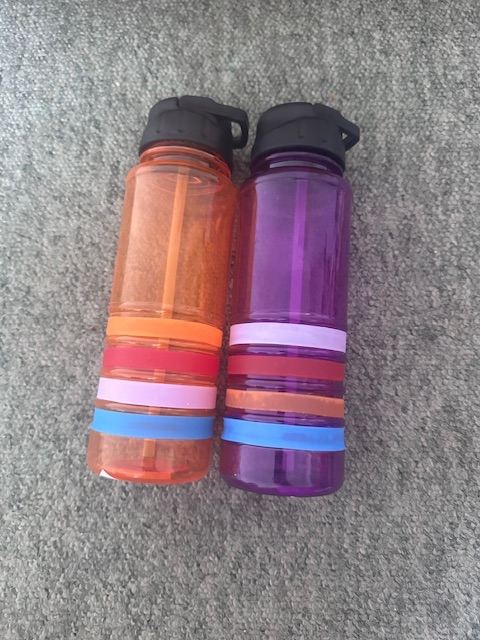 Pair of New Plastic Water Bottles – Orange & Purple