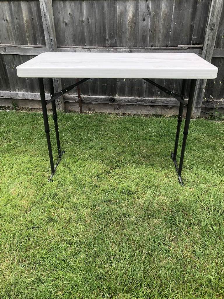 Plastic and steel folding table for camping. caravan, garden or extra surface area 