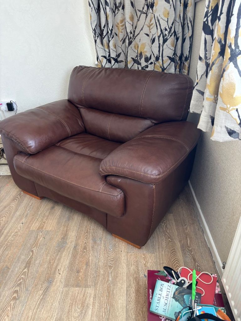 Brown leather cuddle /sofa arm chair 