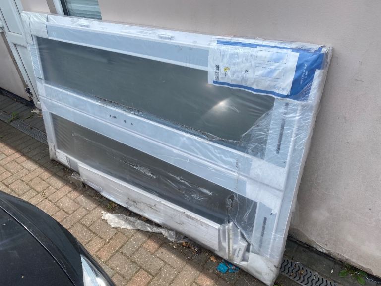 New White French Doors – Still Wrapped