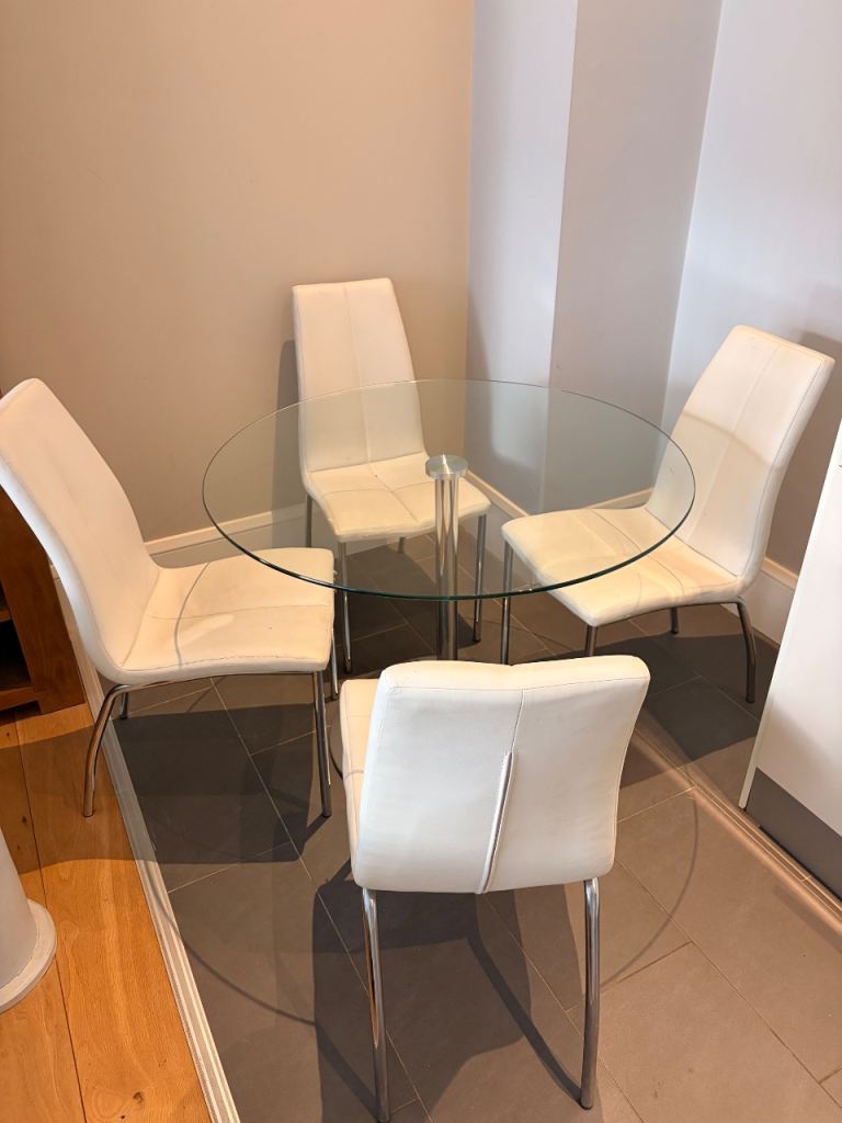 Glass dinning table and chairs 
