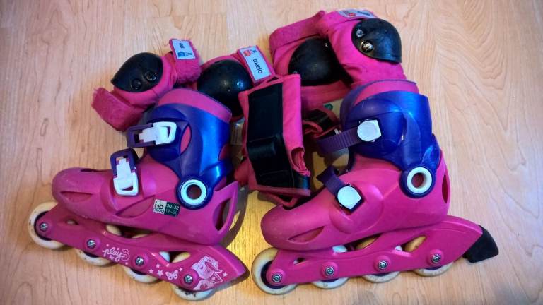 Oxelo Inline skates with safety bits (Decathlon knee & elbow pads).