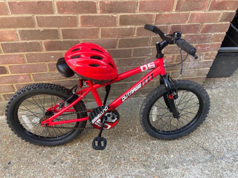 Bike Boy or Girls Outrage Bicycle With New Helmet ( age 5-8)