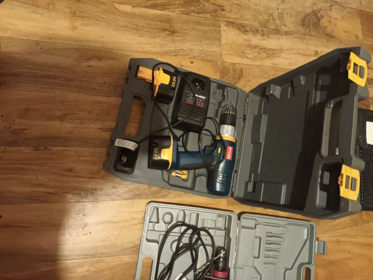 Two cordless drills one drill with coŕdtwo cordless drills