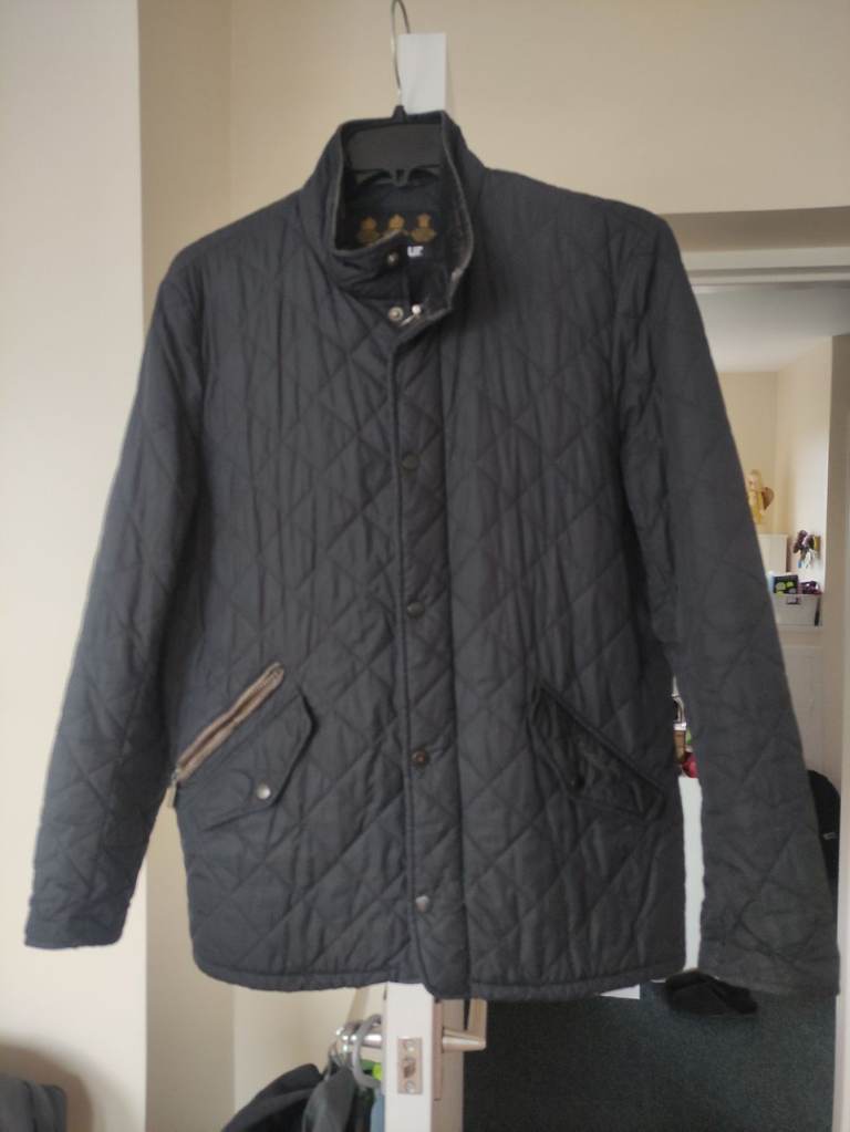 A male Barbour quilted jacket ,size M, in good condition.