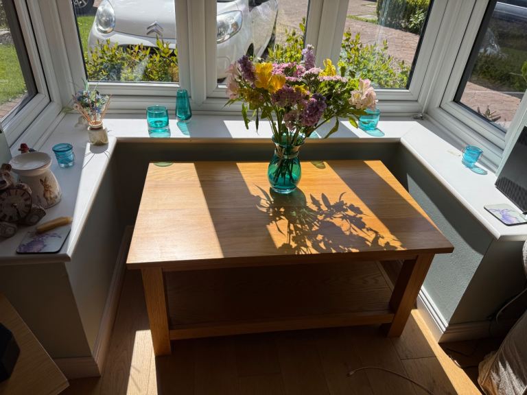 Solid oak two tier coffee table in excellent condition