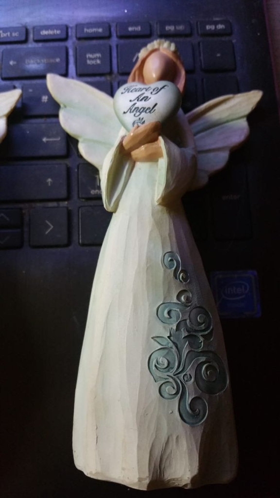 3 Angels one has had it's left wing glued back on hence the price