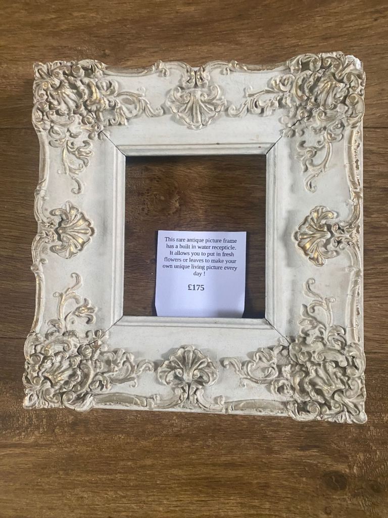 Rare antique picture frame with built in water receptacle 