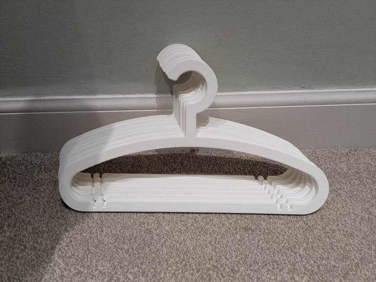x7 IKEA white plastic hangers - £2ono