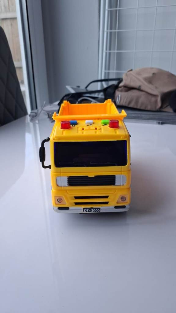 Yellow DT-3000 self-propelled dump truck toy