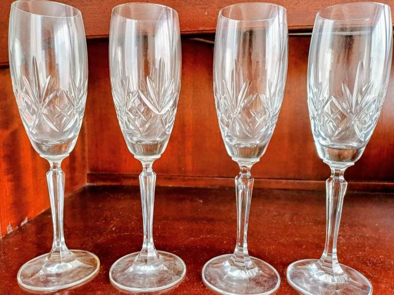 4 cut glass wine/champagne glasses