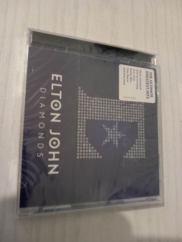 New Elton John Diamonds CDs.  Buyer to collect.  If advert is live then item is still available.