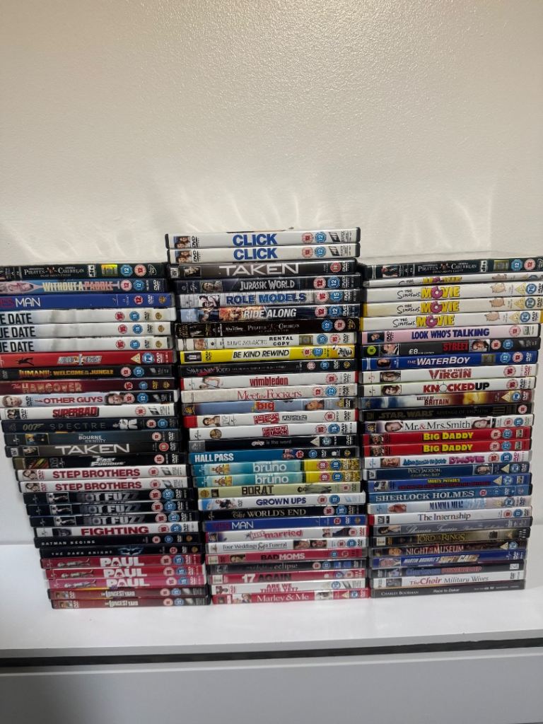 Bundle of 86 DVDs read description 