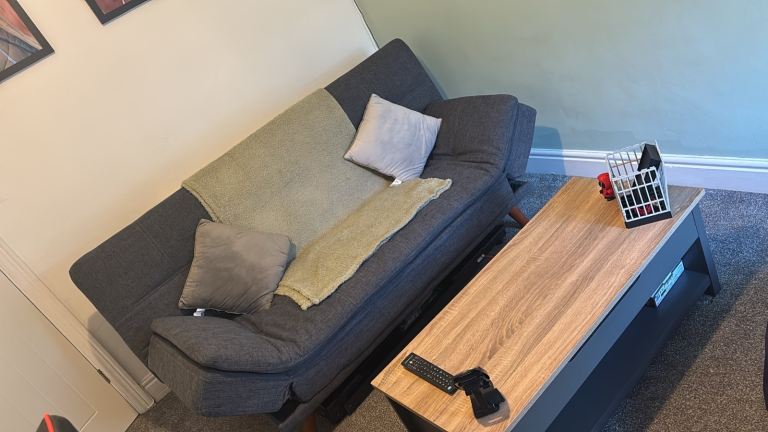 Grey Fabric Sofa Bed with Wooden Legs – Good Condition