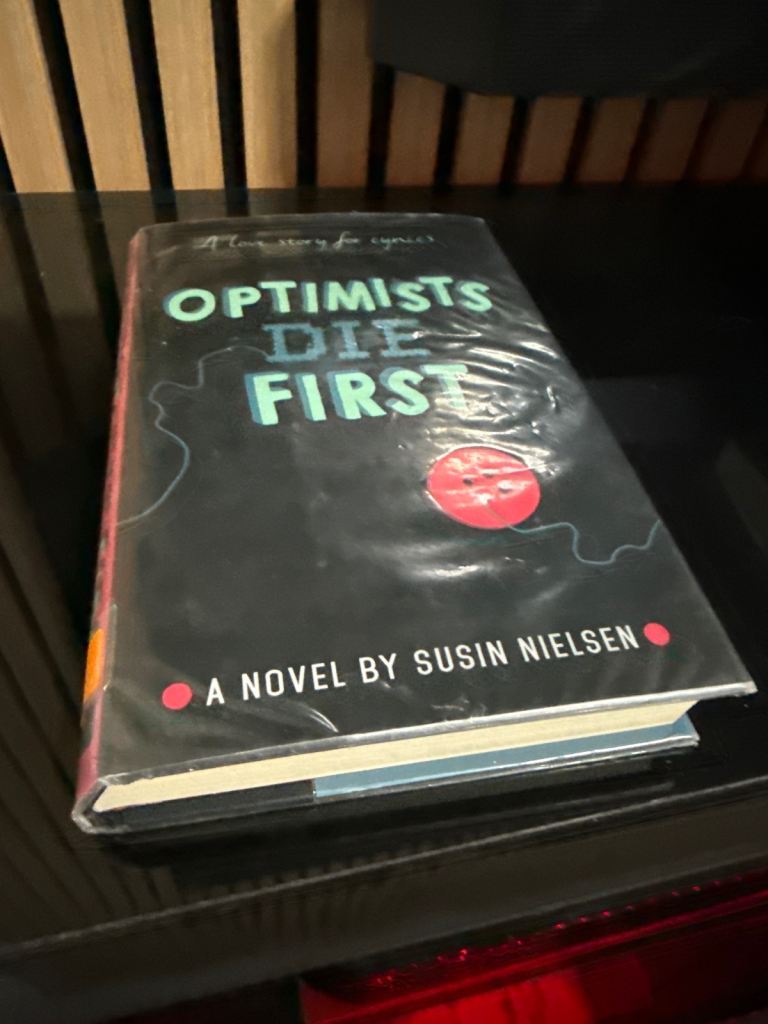 Optimists Die First by Susin Nielsen – As Good As New
