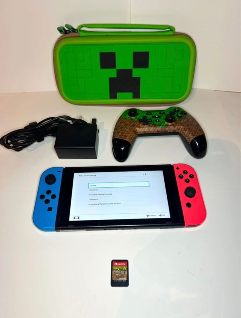 Nintendo Switch with Joy-Cons, Controller, Charger & Case – Good Condition