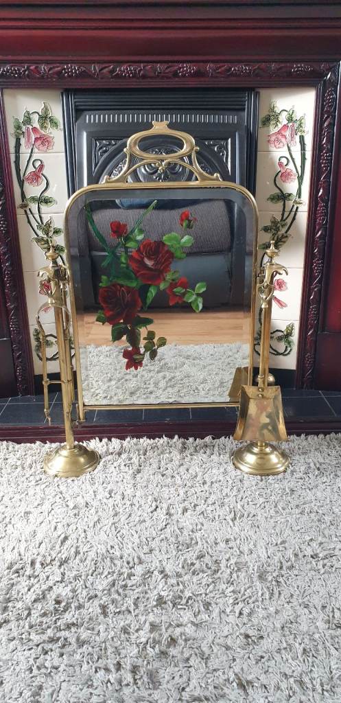 old brass fireplace screen with mirror and companion set