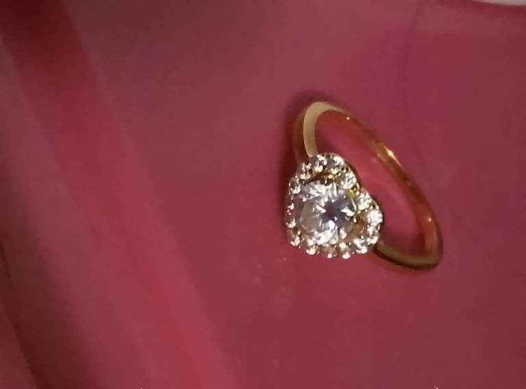 Gold plated ring with heart.