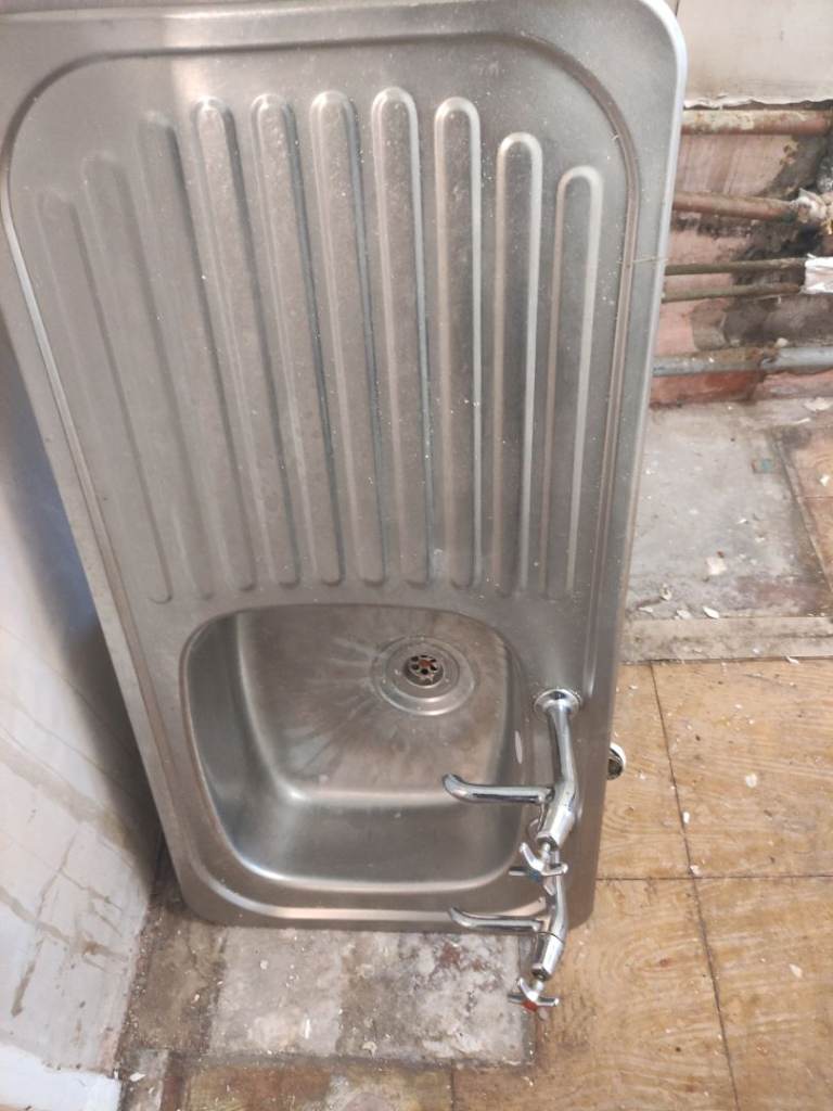 Kitchen sink and taps