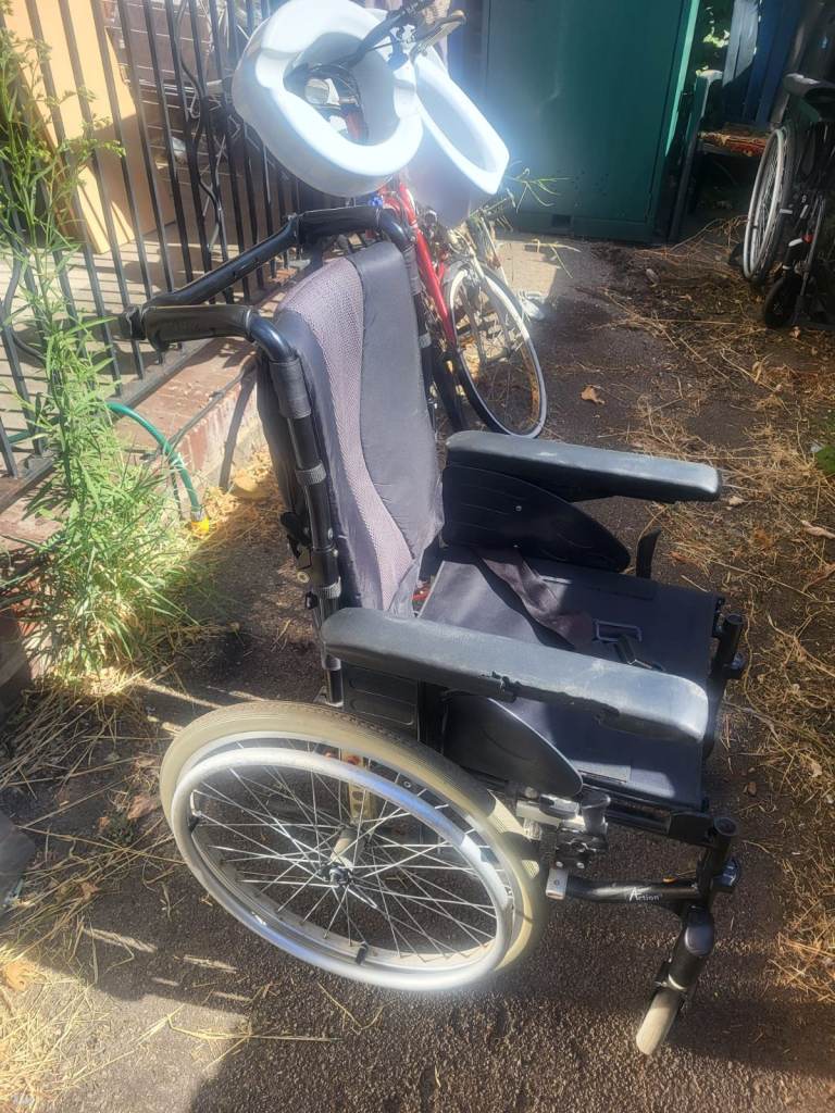 Invacare Action 3NG wheelchair in good, functional condition, without footrests