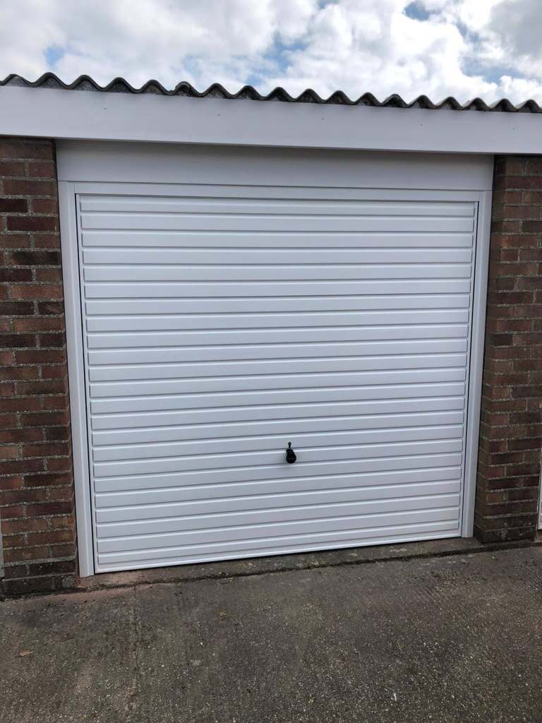 Garages to rent: Somerford Road (r/o 31) Christchurch, BH23 3PF- NEW DOORS FITTED