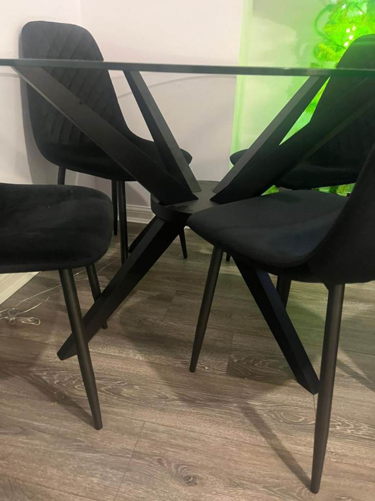 Gorgeous black and glass dinning tabke with 4 black velvet chairs possible delivery 