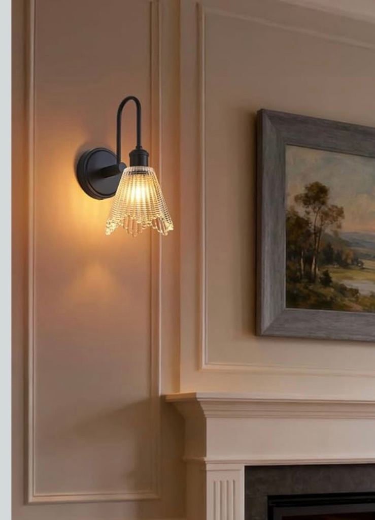 Black art deco style wall light with glass shade