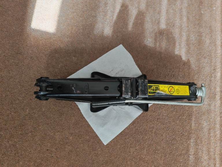 Scissor jack handle attached, from ford transit.