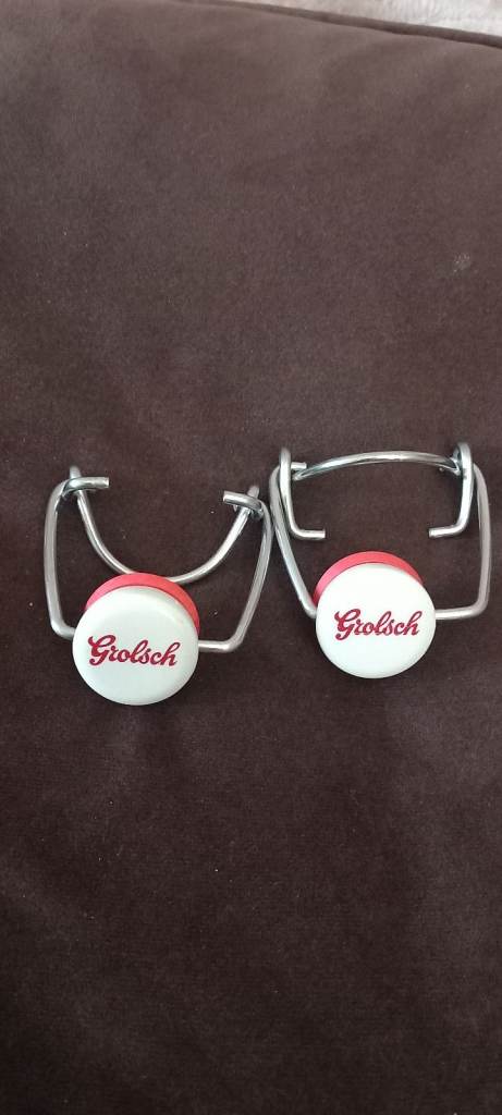 Grolsch bottle swing tops.