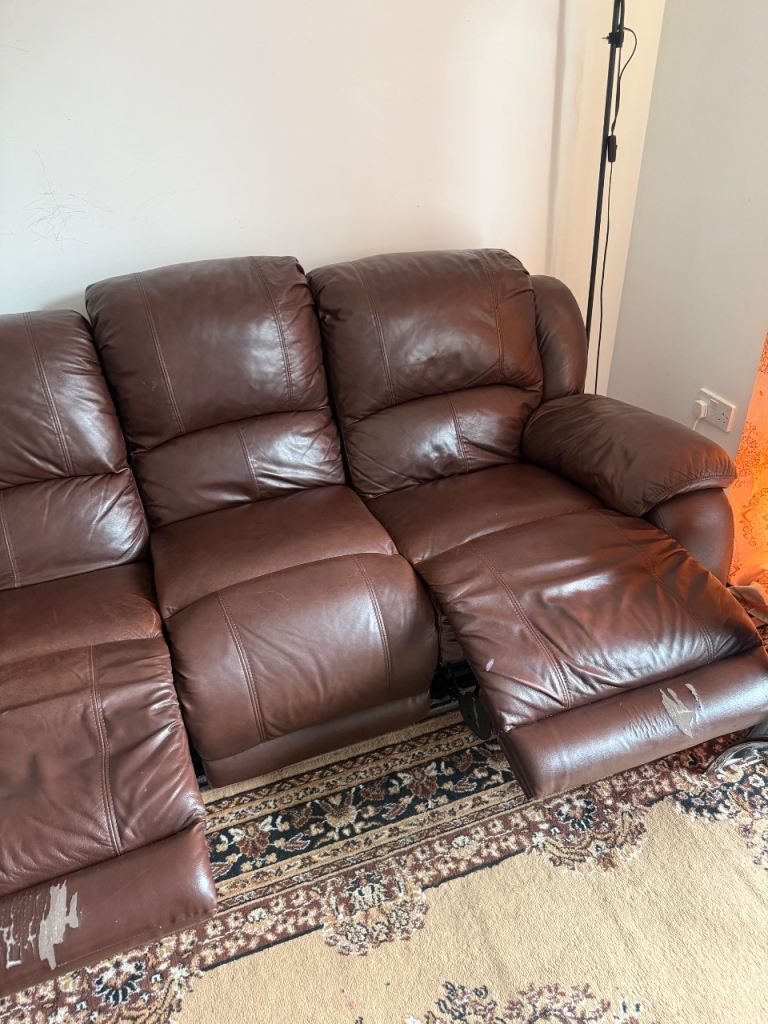 Leather reclining sofa 