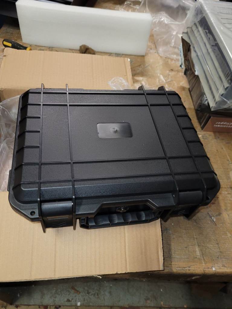 A new black plastic flight case with protective foam inlay the measurements 