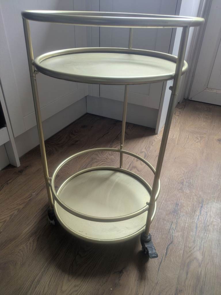Brass coloured drinks trolley 