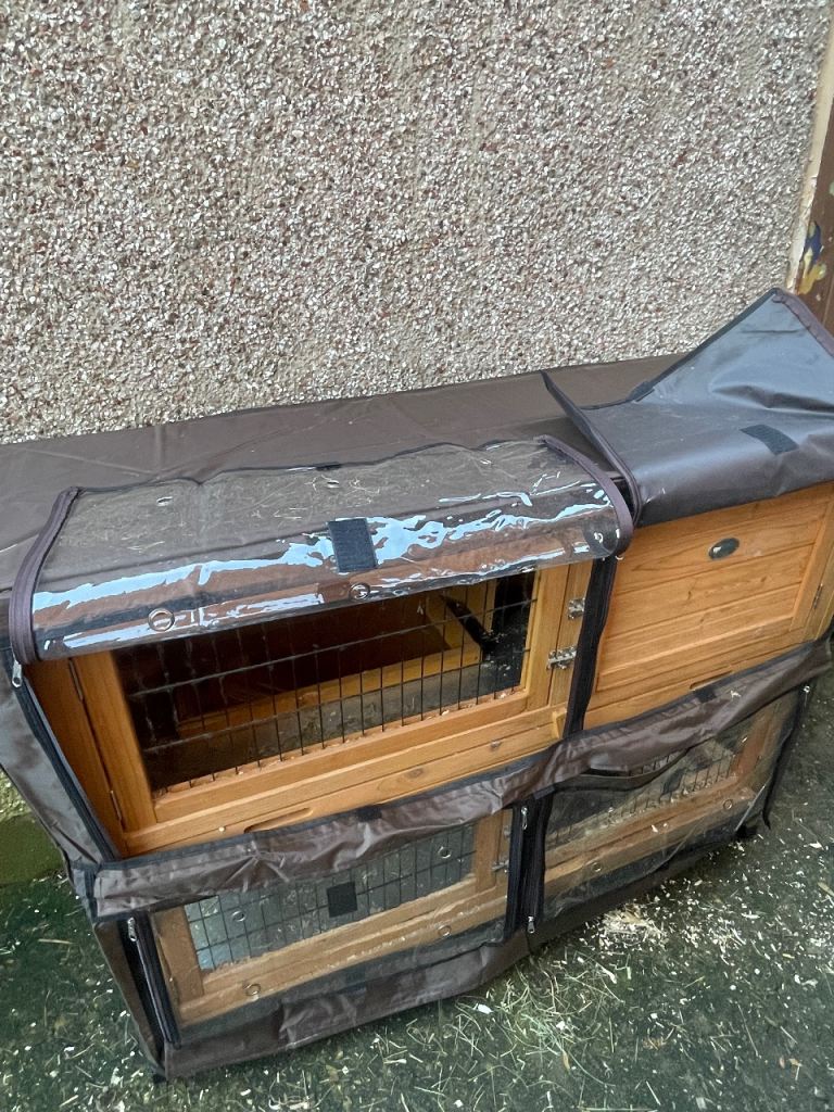 Two tier rabbit hutch with rain cover