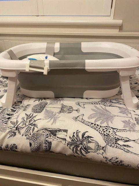 image for Baby Bath with insert and collapsible legs for easy storage and use, new