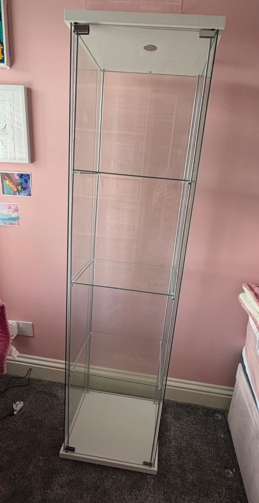 white IKEA DETOLF cabinet - glass display case