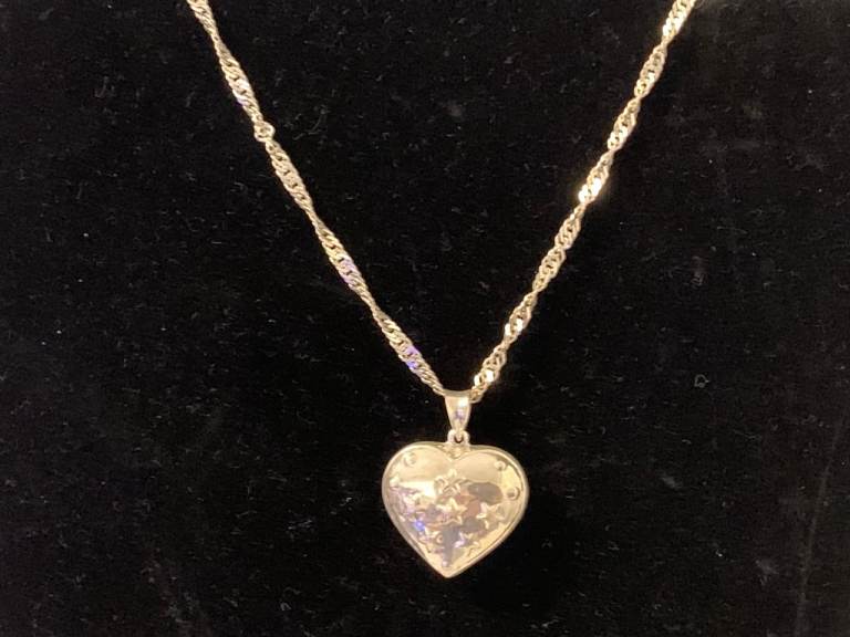 Sterling Silver Puffed Heart Pendant with Star Detailing