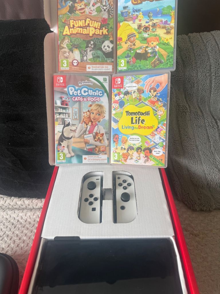 Nintendo Switch OLED White with 4 Games – As New Condition