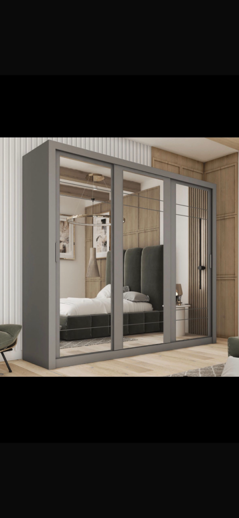3 doored mirrored wardrobe ( band new in boxes )