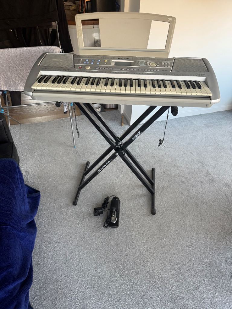 Yamaha PSR-200 portable electronic keyboard on a Duronic KS2 keyboard stand. 