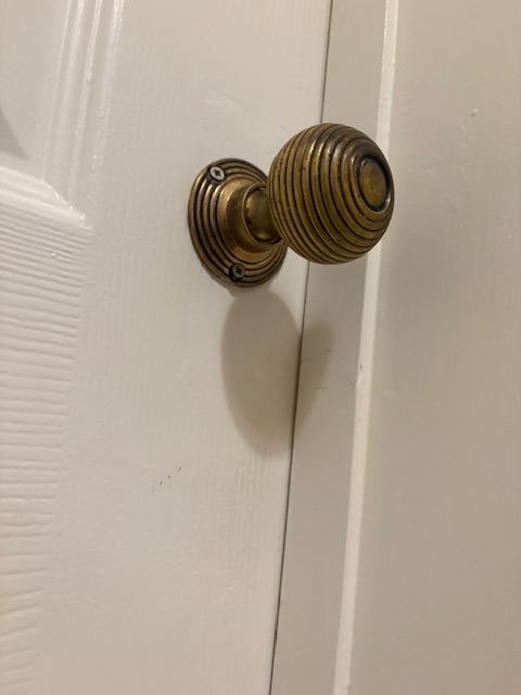 16 pairs of solid aged brass Beehive door knobs