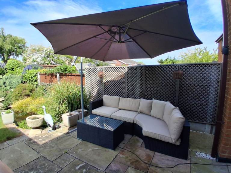 Garden furniture ratan style with cushions and parasol 